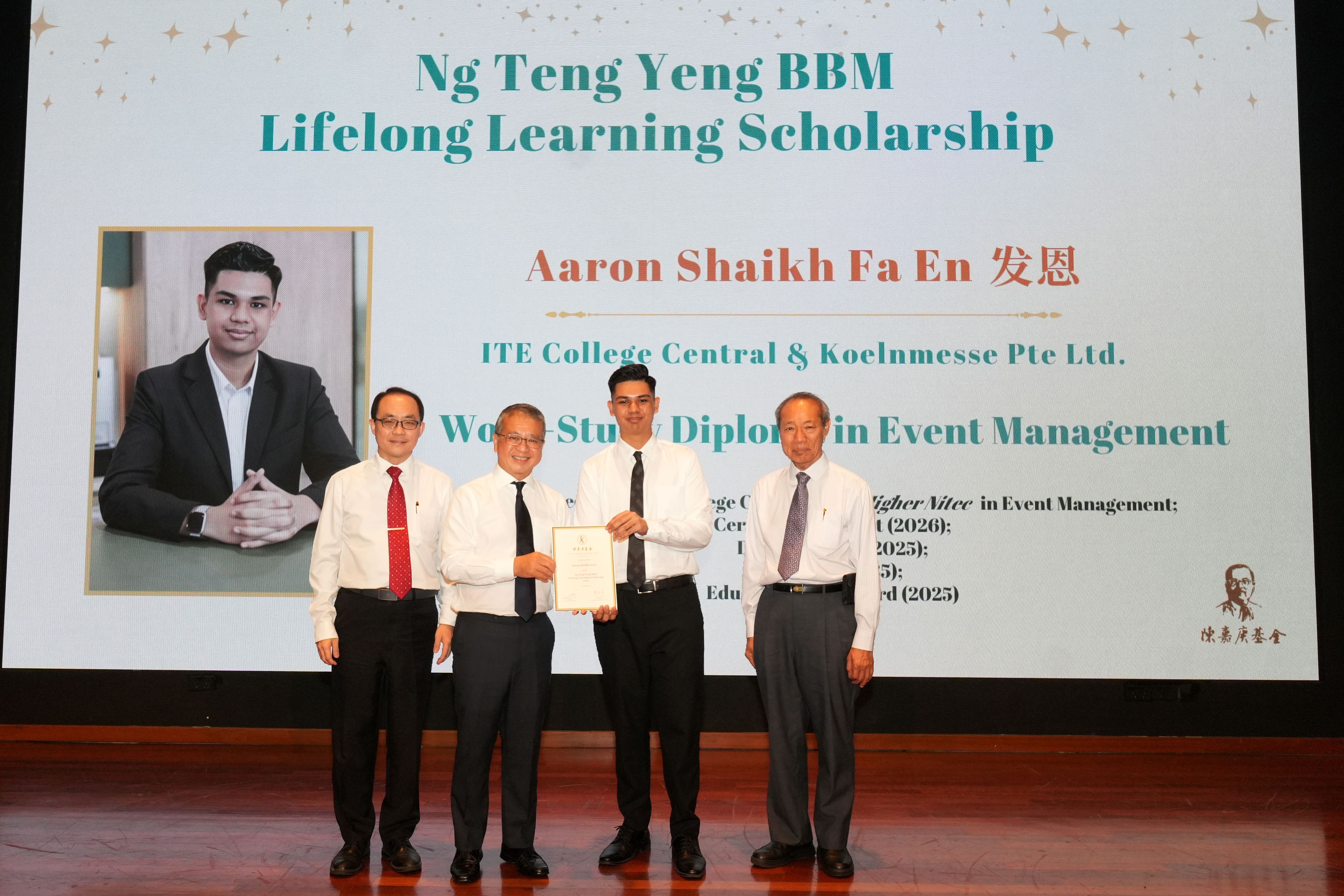 Recipient receiving scholarship on stage